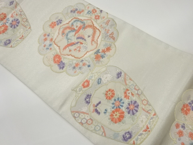 絵皿に壷・鳳凰・草花・蝶模様織出し袋帯